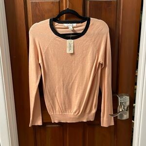 Brand new peach and black preppy sweater size medium